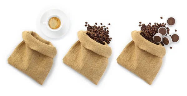 Jutezakken van koffie bonen met een kopje en capsules Rechtenvrije Stockfoto's