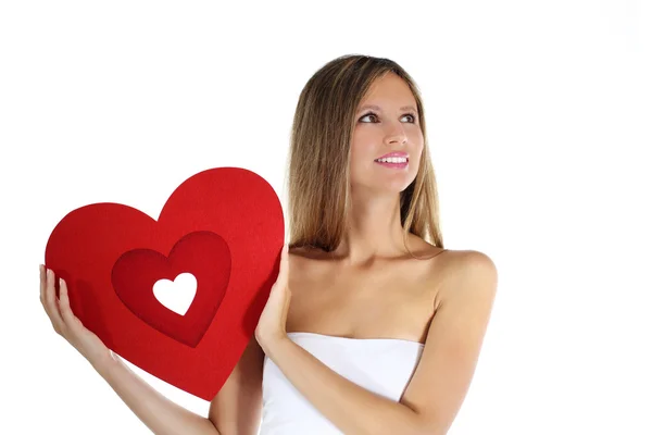 Woman in love with heart in hand Stock Picture