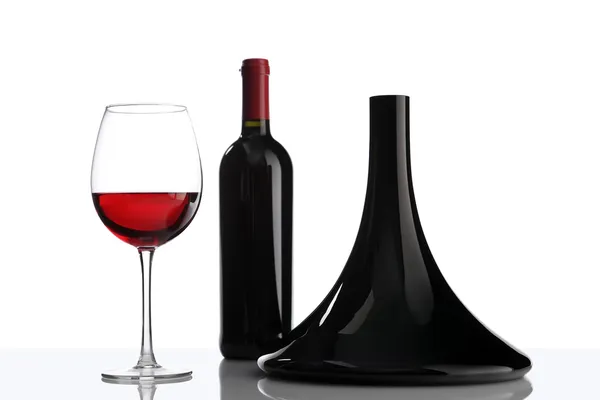 Glass and bottle of red wine decanter — Stock Photo, Image