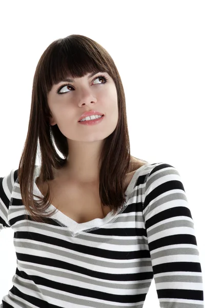 Smiling girl looks up with eyes indicating — Stock Photo, Image