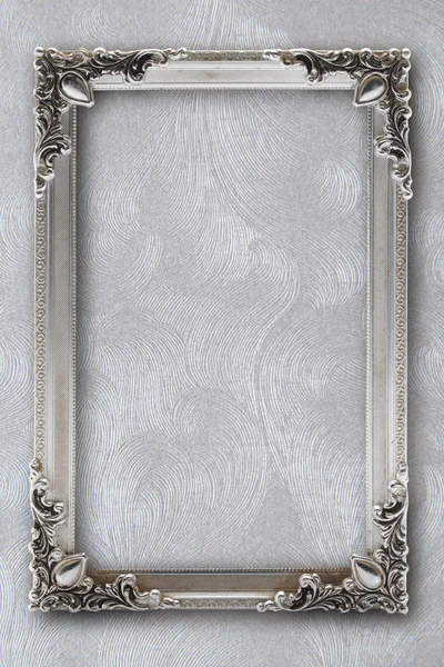 Silver picture frame on background with effects — Stock Photo, Image