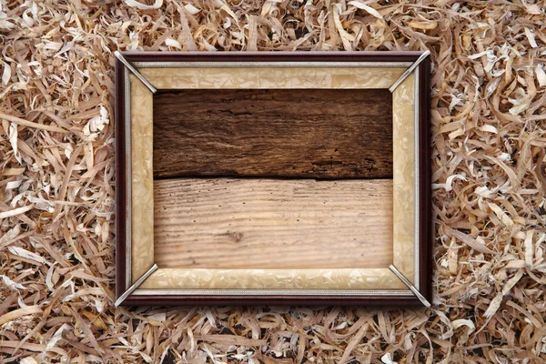 Marco viejo sobre fondo de madera — Foto de Stock