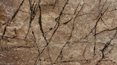 Çeşitli doğal kalıplara sahip doğal taş dokusu. Resimler duvar kağıdı, arkaplan resimleri veya grafik kaynakları olarak kullanmak için uygundur