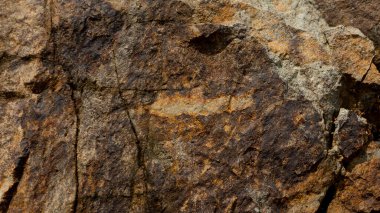 Çeşitli doğal kalıplara sahip doğal taş dokusu. Resimler duvar kağıdı, arkaplan resimleri veya grafik kaynakları olarak kullanmak için uygundur