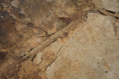 Çeşitli doğal kalıplara sahip doğal taş dokusu. Resimler duvar kağıdı, arkaplan resimleri veya grafik kaynakları olarak kullanmak için uygundur