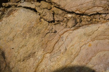 Çeşitli doğal kalıplara sahip doğal taş dokusu. Resimler duvar kağıdı, arkaplan resimleri veya grafik kaynakları olarak kullanmak için uygundur