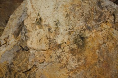 Çeşitli doğal kalıplara sahip doğal taş dokusu. Resimler duvar kağıdı, arkaplan resimleri veya grafik kaynakları olarak kullanmak için uygundur