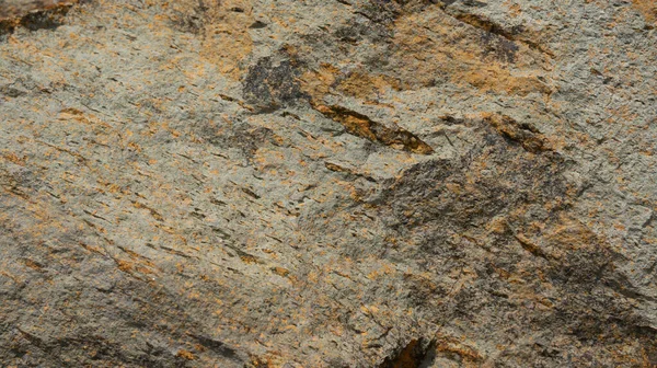 Çeşitli doğal kalıplara sahip doğal taş dokusu. Resimler duvar kağıdı, arkaplan resimleri veya grafik kaynakları olarak kullanmak için uygundur