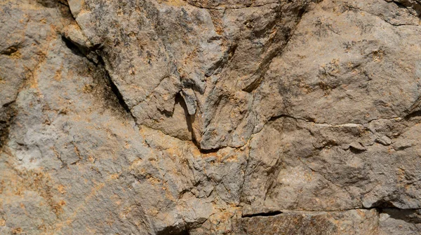 Çeşitli doğal kalıplara sahip doğal taş dokusu. Resimler duvar kağıdı, arkaplan resimleri veya grafik kaynakları olarak kullanmak için uygundur