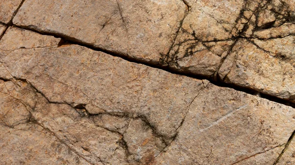 Çeşitli doğal kalıplara sahip doğal taş dokusu. Resimler duvar kağıdı, arkaplan resimleri veya grafik kaynakları olarak kullanmak için uygundur