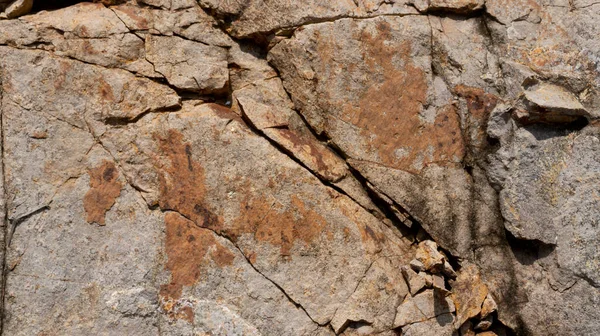 Çeşitli doğal kalıplara sahip doğal taş dokusu. Resimler duvar kağıdı, arkaplan resimleri veya grafik kaynakları olarak kullanmak için uygundur