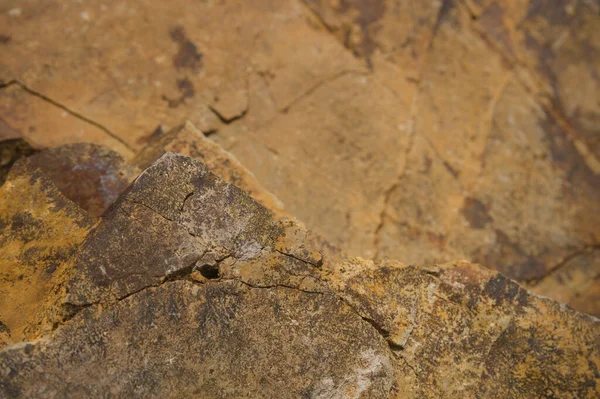 Çeşitli doğal kalıplara sahip doğal taş dokusu. Resimler duvar kağıdı, arkaplan resimleri veya grafik kaynakları olarak kullanmak için uygundur