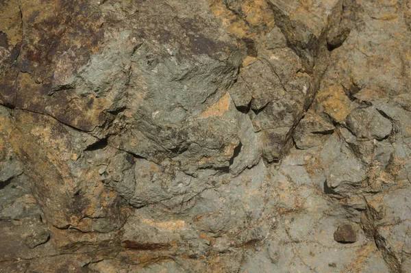 Çeşitli doğal kalıplara sahip doğal taş dokusu. Resimler duvar kağıdı, arkaplan resimleri veya grafik kaynakları olarak kullanmak için uygundur