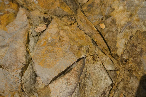 Çeşitli doğal kalıplara sahip doğal taş dokusu. Resimler duvar kağıdı, arkaplan resimleri veya grafik kaynakları olarak kullanmak için uygundur