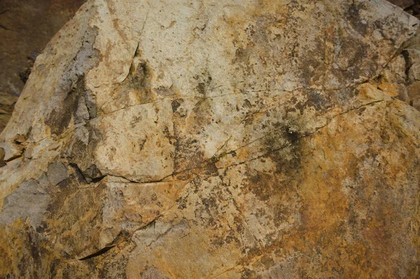 Çeşitli doğal kalıplara sahip doğal taş dokusu. Resimler duvar kağıdı, arkaplan resimleri veya grafik kaynakları olarak kullanmak için uygundur