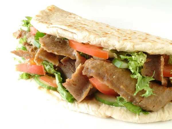 Donner kebab meat wrapped in naan bread — Stock Photo, Image