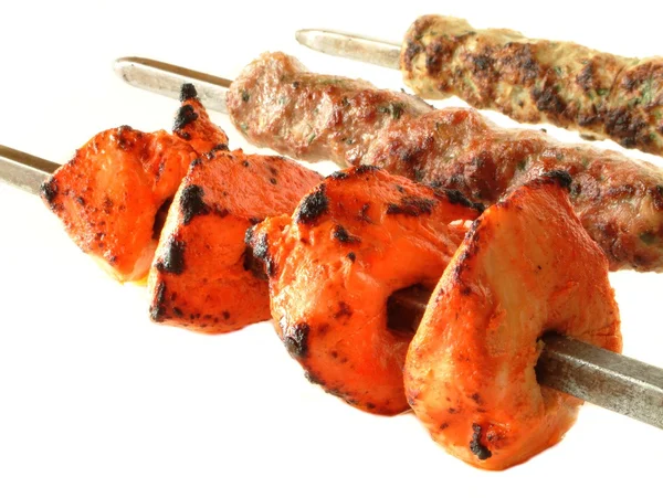 Kofta shish and tikka kebabs on white — Stock Photo, Image
