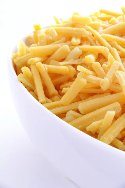 Grated cheese in white bowl — Stock Photo, Image