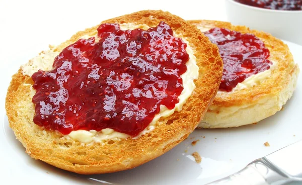 Tasted bread rolls with jam — Stock Photo, Image