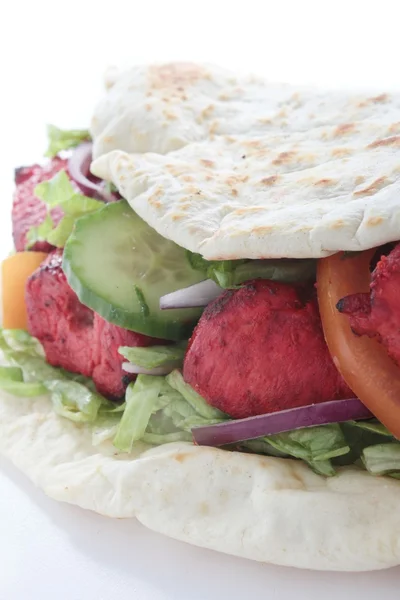 Indian chicken tikka naan bread sandwich — Stock Photo, Image