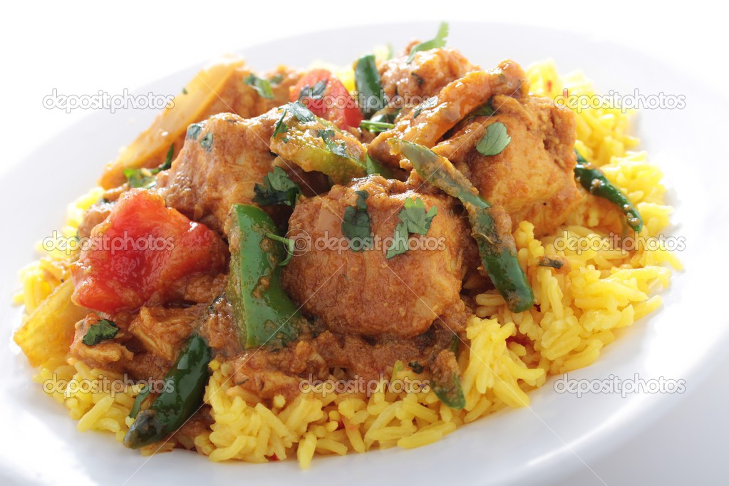 Traditional chicken jalfrezzi curry with pilau rice