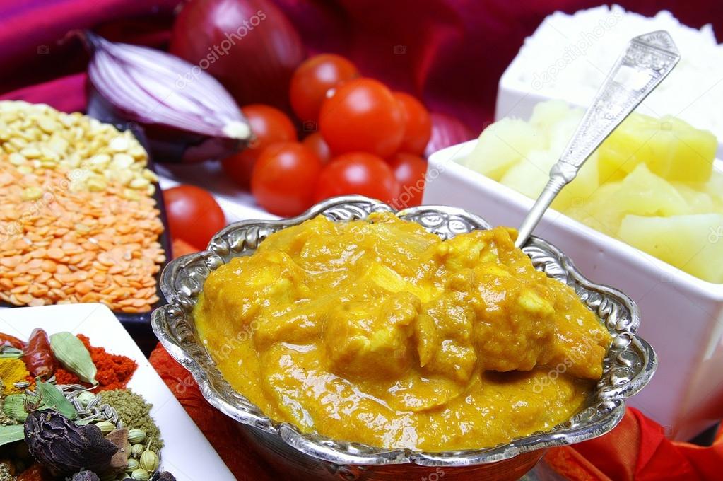 Traditional Indian chicken korma curry Stock Photo by ©neillangan 41402129