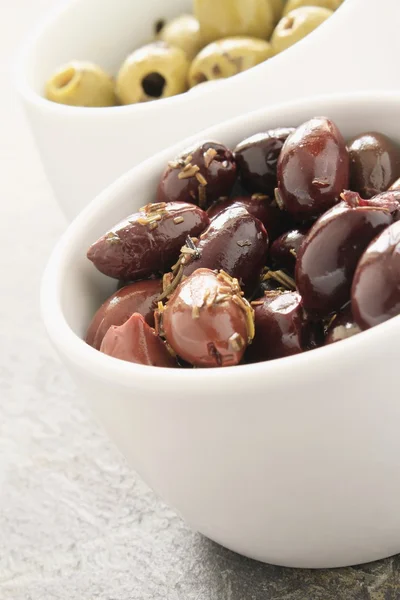 Fresh olives black green in dish — Stock Photo, Image
