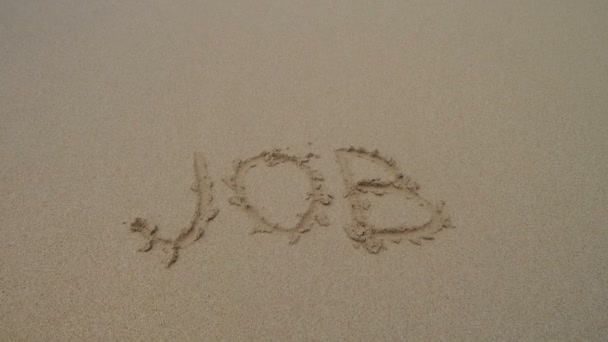 単語の仕事を砂に書かれました。 — ストック動画