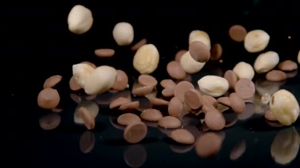 MACRO: Healthy muesli mixture gets scattered across an empty kitchen counter. — Stock Video