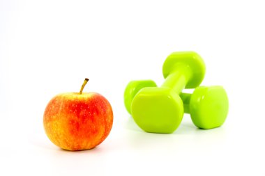 Two dumbbells and the apple