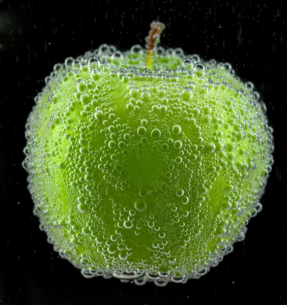 Green apple with bubbles — Stock Photo, Image