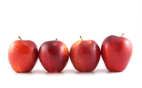 Čtyři červená jablka — Stock fotografie