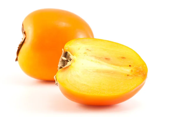 Orange persimmon with sliced one — Stock Photo, Image