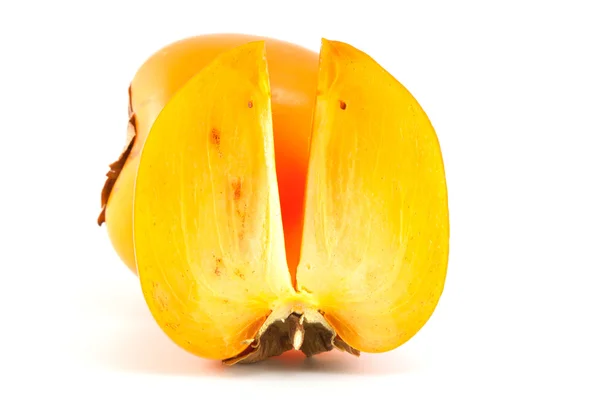 Cáqui-de-laranja com um fatiado — Fotografia de Stock