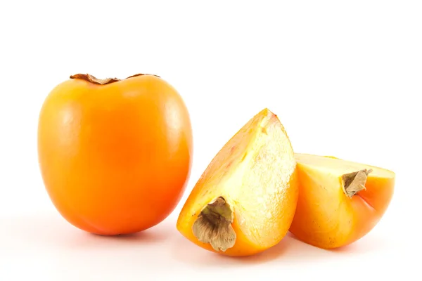 Orange persimmon with slices — Stock Photo, Image
