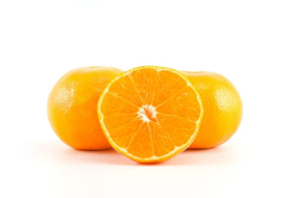 Mandarins or tangerines and a slice — Stock Photo, Image