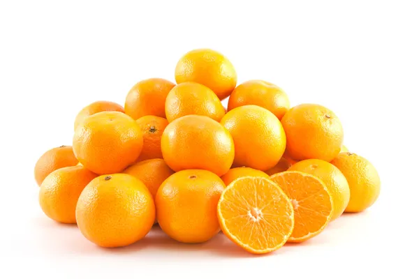 Um monte de tangerinas ou tangerinas — Fotografia de Stock