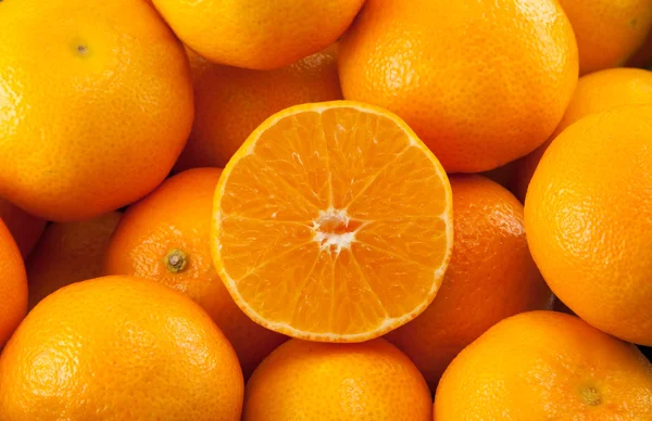 A lot of mandarins or tangerines — Stock Photo, Image
