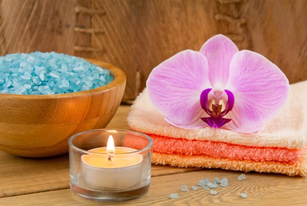Spa Treatment with candle, orchid and sea salt — Stock Photo, Image