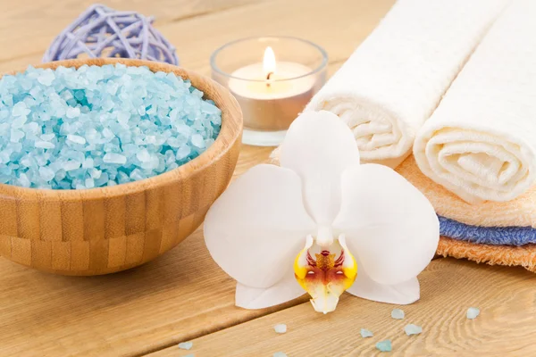 Spa Treatment with candle and blue sea salt — Stock Photo, Image