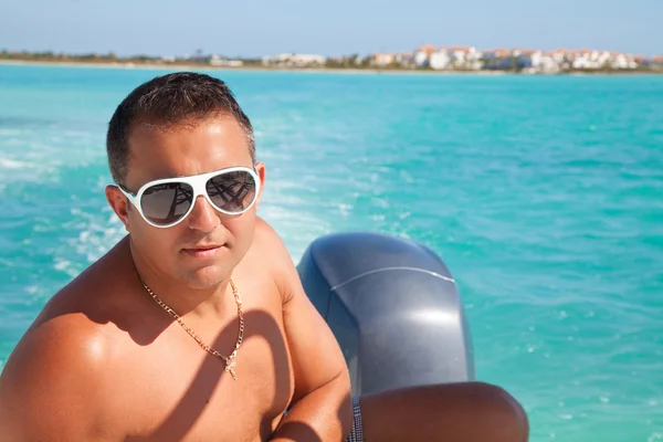 Man resting on the water — Stock Photo, Image