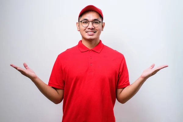 Young Handsome Asian Delivery Man Wearing Delivery Uniform Smiling Showing Stock Image