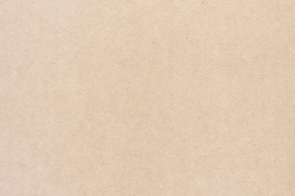 A sheet of brown cardboard. Paper natural texture.