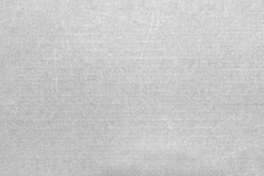 Kalitesiz karton çarşaf. Kağıt dokusu, küçük lekeler ve çizikler..