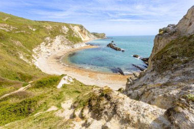Mupe Körfezi - Dorset, İngiltere 'de Lulworth Koyu' nun doğusunda bir körfez sahili.