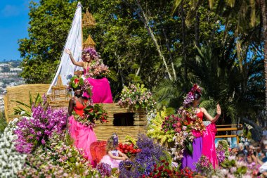 Funchal, Madeira - May 8, 2022: The famous Flower Festival (Festa da flor) in Madeira. The flower parade in Funchal.