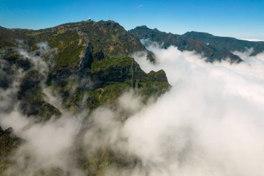 The view of the clouds around the radar dome on Pico do Arieiro. Madeira Island, Portugal.
