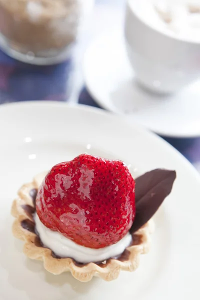 Strawberry tart on white plate — Stock Photo, Image