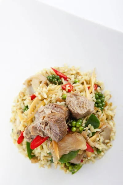 Spicy stir fried rice with beef and herbs — Stock Photo, Image