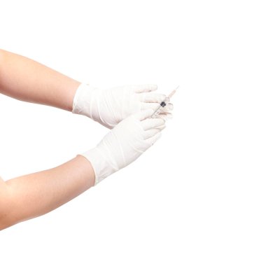 Hand wearing white gloves holding syringe for injection isolated on white